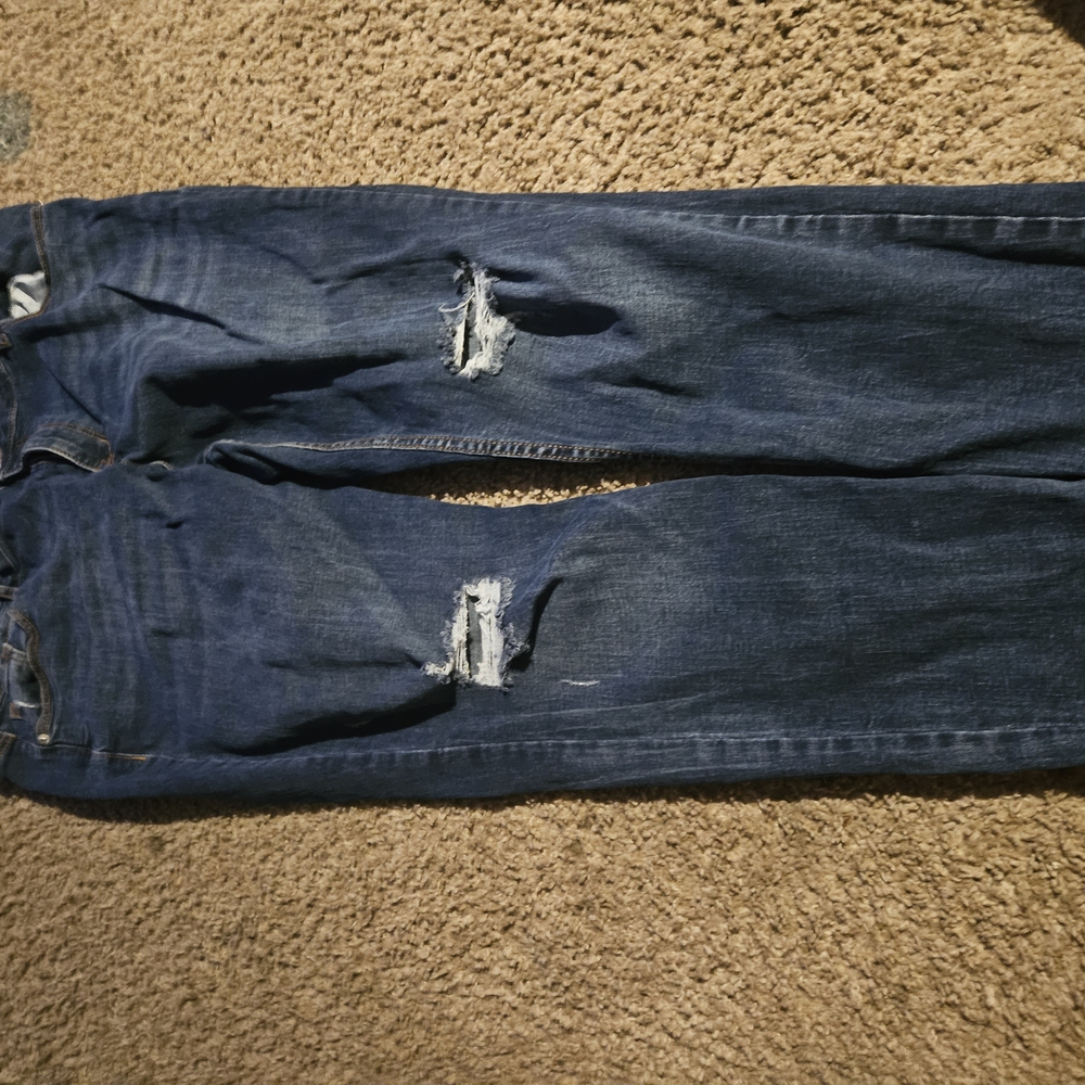 Distressed Blue Jeans